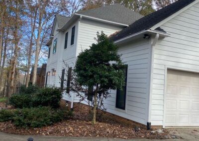 before image of the side of a house in Matthews, NC before getting new James Hardie siding