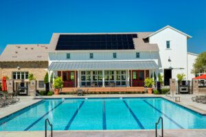 Community pool house roof with solar panels