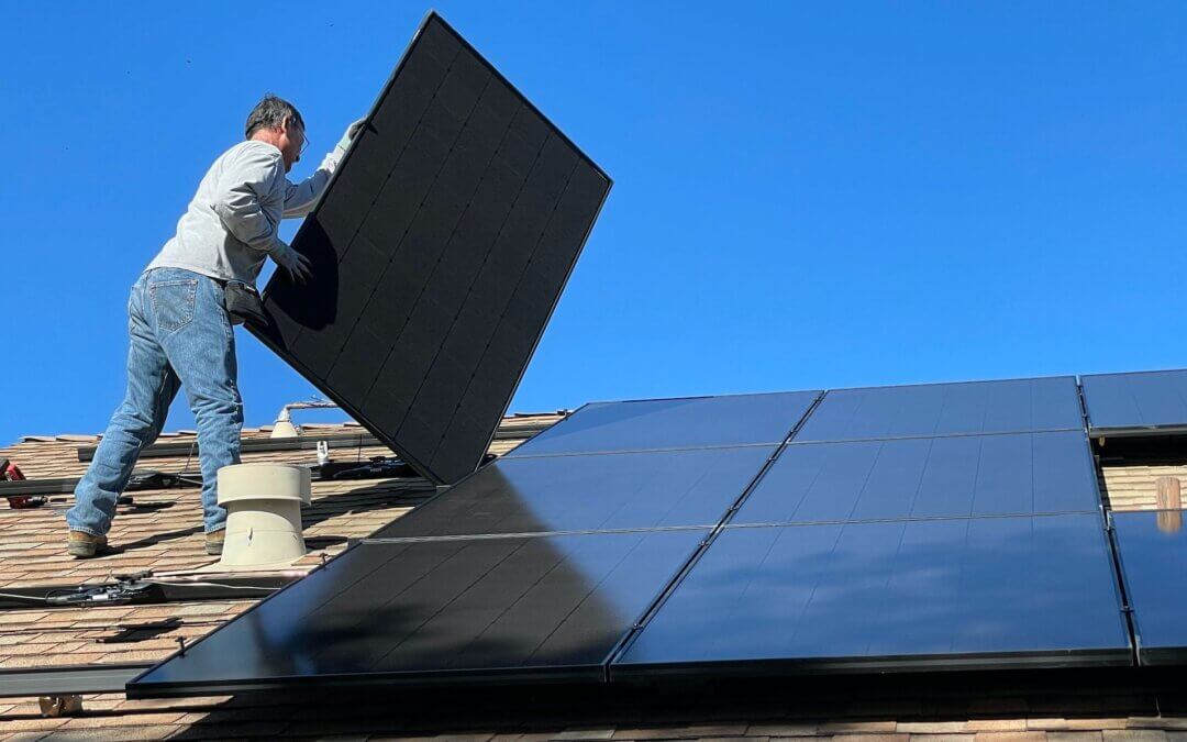 Crew-member from Southern Home Pros working on solar panel installation