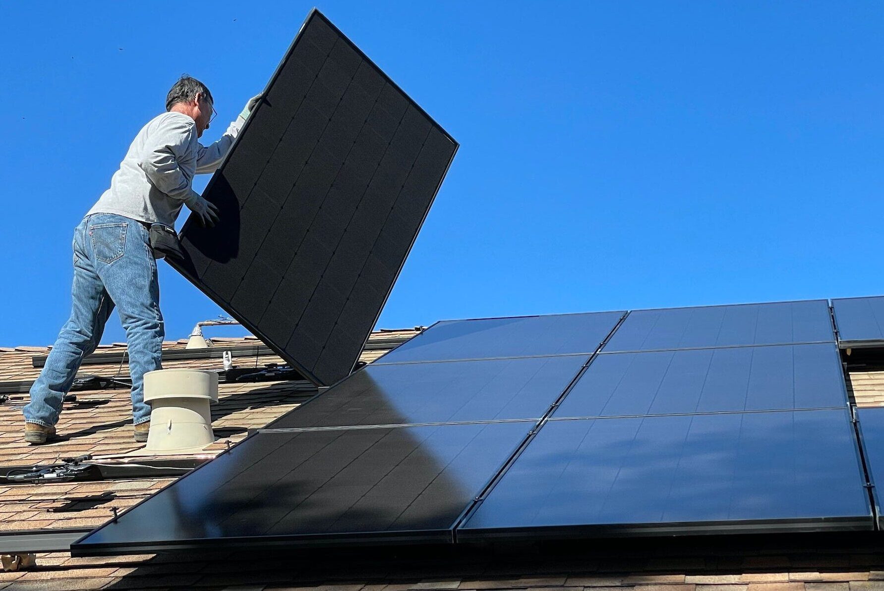 Crew-member from Southern Home Pros working on solar panel installation