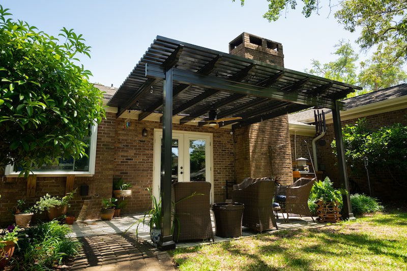expert patio cover installation in a backyard