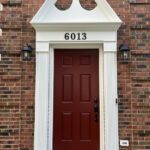 Heritage entry door in mountain berry red