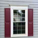 Raised panel vinyl shutters Color: Wineberry