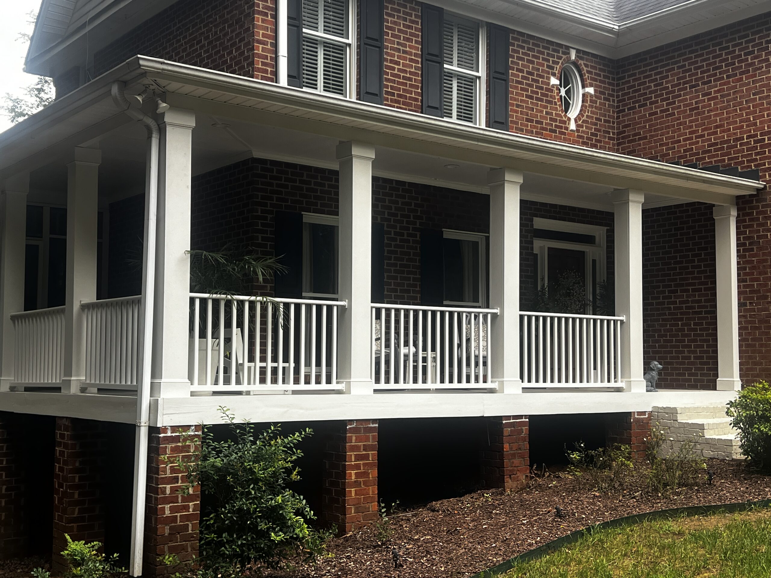 Home in Matthews, NC with a new white porch