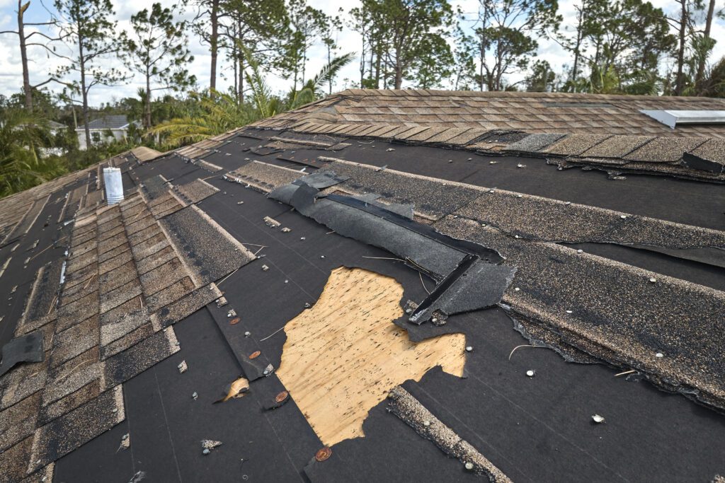 Damaged or misaligned shingles are one of the key signs of a bad roof installation.