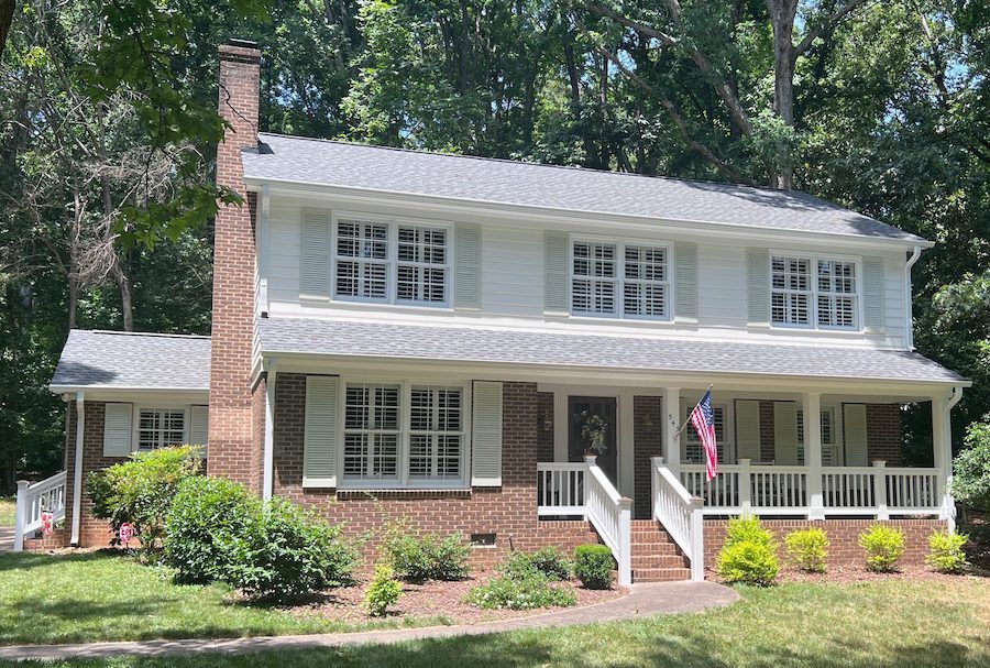 White siding on exterior of home