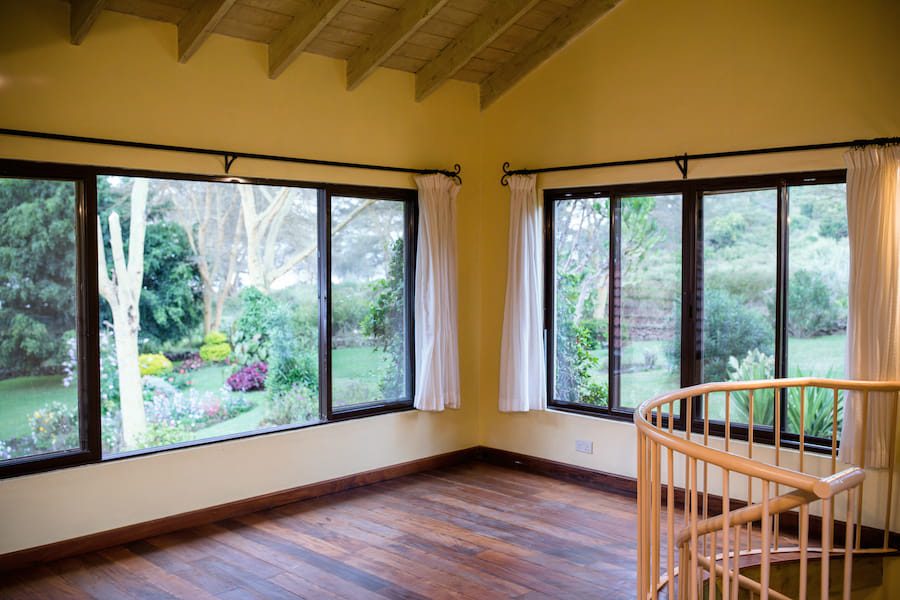 Bright new replacement windows enhancing a Monroe home exterior