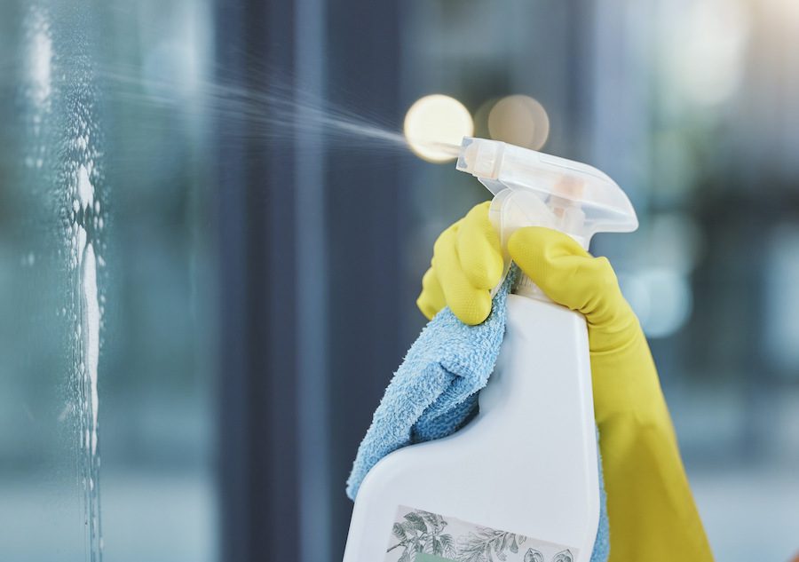 Cleaning Solution Spraying On Glass for Disinfection