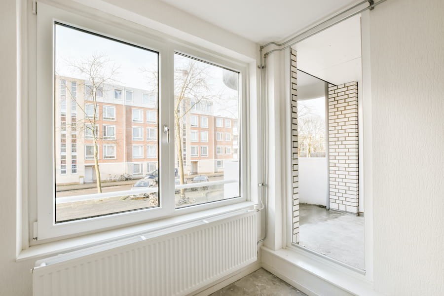 Apartment Interior with City View Through Window